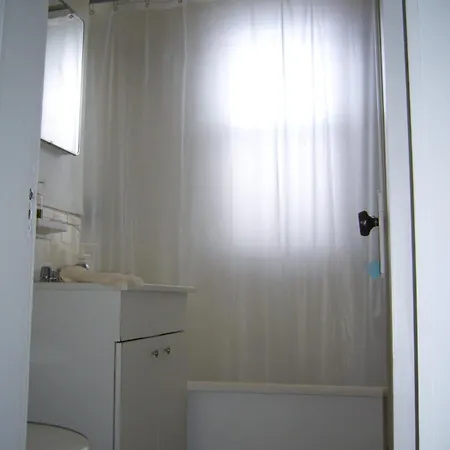 This Inviting Space Is Ideal For Families Friends Or Small Groups Looking Apartment